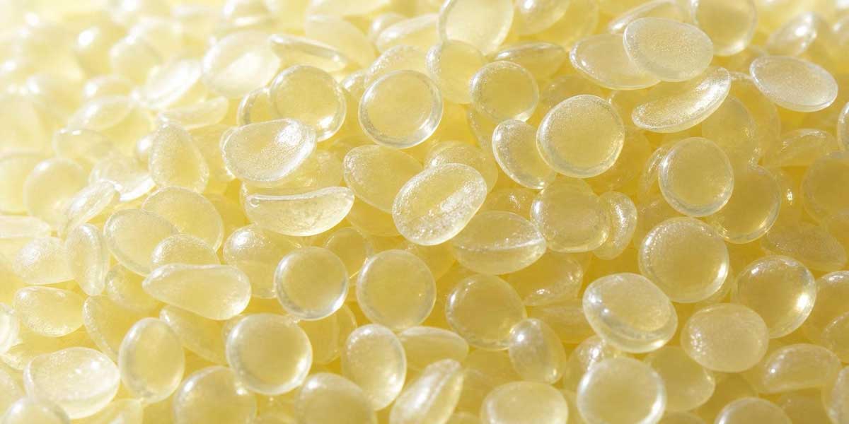 High-Quality C5 Aliphatic Hydrocarbon Resin Granules Close-up of translucent, light yellow C5 petroleum hydrocarbon resin pellets for industrial manufacturing.